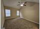 Spacious main bedroom with vaulted ceiling, ceiling fan and plush carpet at 3081 Regal Dr, Mcdonough, GA 30253