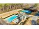 Overhead shot of community amenities: pool, tennis courts, playground, and well-maintained surroundings at 418 Crosshaven Way, Mcdonough, GA 30253