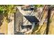 Overhead view of a well maintained home highlighting the roof, driveway and surrounding landscape at 418 Crosshaven Way, Mcdonough, GA 30253