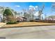 Lovely brick home with blue shutters and manicured landscaping enhancing its inviting curb appeal at 418 Crosshaven Way, Mcdonough, GA 30253