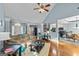 Bright living room with vaulted ceilings, hardwood floors, and comfortable seating at 418 Crosshaven Way, Mcdonough, GA 30253