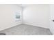Neutral carpeted bedroom with window allowing natural light at 3382 Arabian Farm Ln, Dacula, GA 30019