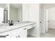 Bathroom vanity features granite countertop and ample storage at 3734 Saddle Bag Ct, Dacula, GA 30019