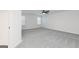 Spacious bedroom featuring a ceiling fan, neutral paint, and carpet at 3734 Saddle Bag Ct, Dacula, GA 30019