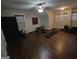 Large bonus room featuring hardwood floors, a ceiling fan, and plenty of space at 57 Deer Creek Run, Moreland, GA 30259