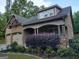 Close up of the attractive stone and siding details of the home's exterior and covered porch at 57 Deer Creek Run, Moreland, GA 30259