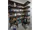 Walk-in pantry featuring wooden shelving for food and kitchen storage at 57 Deer Creek Run, Moreland, GA 30259