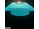 Tranquil shot of a well-lit swimming pool, promising relaxation and enjoyment at 57 Deer Creek Run, Moreland, GA 30259