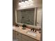 Bathroom features double sinks, marble countertop, and tiled walk-in shower at 2220 Cambridge Hill Ct, Dacula, GA 30019