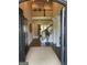 Grand foyer entrance featuring dark hardwood floors, upper level landing, and neutral walls, creating a welcoming atmosphere at 2220 Cambridge Hill Ct, Dacula, GA 30019