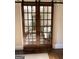 Elegant interior doors with glass panes and black hardware providing style and separation between rooms at 2220 Cambridge Hill Ct, Dacula, GA 30019
