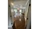 Spacious main bedroom features hardwood floors, trey ceiling, and elegant furnishings at 2220 Cambridge Hill Ct, Dacula, GA 30019