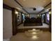 This home theater room features tiered seating and sconce lighting at 2220 Cambridge Hill Ct, Dacula, GA 30019