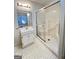 Bright bathroom featuring shower, sink, and tile floors at 363 Seminole Drs, Marietta, GA 30060