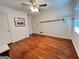 Bedroom featuring hardwood floors, ceiling fan, and a window bringing in natural light at 363 Seminole Drs, Marietta, GA 30060