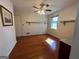 Bedroom featuring hardwood floors, ceiling fan, and a window bringing in natural light at 363 Seminole Drs, Marietta, GA 30060