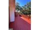 Spacious red painted deck with red railings, offering a serene outdoor living space at 363 Seminole Drs, Marietta, GA 30060