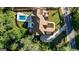 Aerial view of a home with a backyard pool and manicured landscaping at 490 Mount Paran Rd, Atlanta, GA 30327