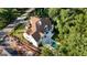 Aerial view of a luxury home with a pool and landscaped backyard at 490 Mount Paran Rd, Atlanta, GA 30327