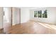Bright bedroom showcases hardwood floors, large windows, and neutral walls for a serene atmosphere at 490 Mount Paran Rd, Atlanta, GA 30327