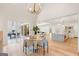 Dining area leading into the living room with an airy design and easy access to the outside patio at 490 Mount Paran Rd, Atlanta, GA 30327