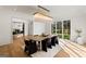 Beautiful dining room featuring a modern chandelier and views to the living area at 490 Mount Paran Rd, Atlanta, GA 30327