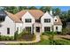 Stunning home with a stone facade, lush landscaping, and a welcoming entrance at 490 Mount Paran Rd, Atlanta, GA 30327