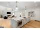 Modern kitchen with stainless appliances, marble counters and island, and an open floor plan at 490 Mount Paran Rd, Atlanta, GA 30327