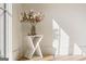 Elegant corner vignette featuring natural light and a decorative table with a vase at 490 Mount Paran Rd, Atlanta, GA 30327