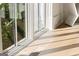 Bright living space featuring a sliding glass door and light hardwood floors at 490 Mount Paran Rd, Atlanta, GA 30327