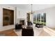 Cozy living room featuring a fireplace, built-in shelves, and ample seating at 490 Mount Paran Rd, Atlanta, GA 30327