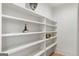 Built-in shelving provides functional space for decor and organization at 490 Mount Paran Rd, Atlanta, GA 30327