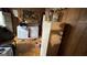 Kitchen featuring a washing machine and dryer, along with dated wood-paneled walls and cabinets at 2234 Glendale Dr, Decatur, GA 30032