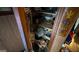 A view of an open cabinet with items stored at 2234 Glendale Dr, Decatur, GA 30032