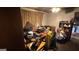 Cluttered room with a desk piled high with items, along with various other belongings scattered around at 2234 Glendale Dr, Decatur, GA 30032