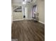 Bedroom has hardwood floors, neutral paint and a view into another room at 4230 Vinca Way, Union City, GA 30291