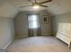 Large bedroom with carpet, ceiling fan, white headboard, and window with decorative curtains at 4230 Vinca Way, Union City, GA 30291