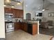 Well-equipped kitchen featuring stainless steel appliances and a breakfast bar area at 4230 Vinca Way, Union City, GA 30291