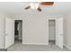 Inviting bedroom with closet and attached room, carpet, neutral walls and a ceiling fan at 134 Ashwood Dr, Waco, GA 30182