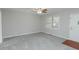 Carpeted living room with neutral paint and front door at 134 Ashwood Dr, Waco, GA 30182