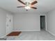 Bright living room with neutral walls, new carpet, and a welcoming front door at 134 Ashwood Dr, Waco, GA 30182