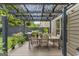 Enjoy this backyard deck with grill, dining table, and pergola for outdoor living and entertaining at 5768 Grande River Rd, Atlanta, GA 30349