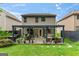 Inviting backyard deck area with a stylish pergola, perfect for outdoor entertaining and relaxation at 5768 Grande River Rd, Atlanta, GA 30349