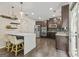 Stylish kitchen featuring stainless appliances, granite counters, and bar seating at 5768 Grande River Rd, Atlanta, GA 30349