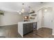 Spacious living area showcasing a center island, fireplace and hardwood floors at 5768 Grande River Rd, Atlanta, GA 30349