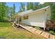 Ramp offering easy access to the home's covered front porch at 180 E Ranchette Rd, Temple, GA 30179
