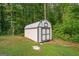 New storage shed in a backyard at 180 E Ranchette Rd, Temple, GA 30179