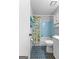 Bathroom featuring a bathtub with shower, seashell shower curtain, and a vanity at 295 Merrydale Dr, Fayetteville, GA 30215
