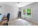 Cozy breakfast area with a ceiling fan and bright natural light, perfect for casual dining at 295 Merrydale Dr, Fayetteville, GA 30215