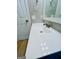 Bright bathroom featuring a white vanity with a modern faucet and a clean, minimalist design at 2502 Barge Sw Rd, Atlanta, GA 30331